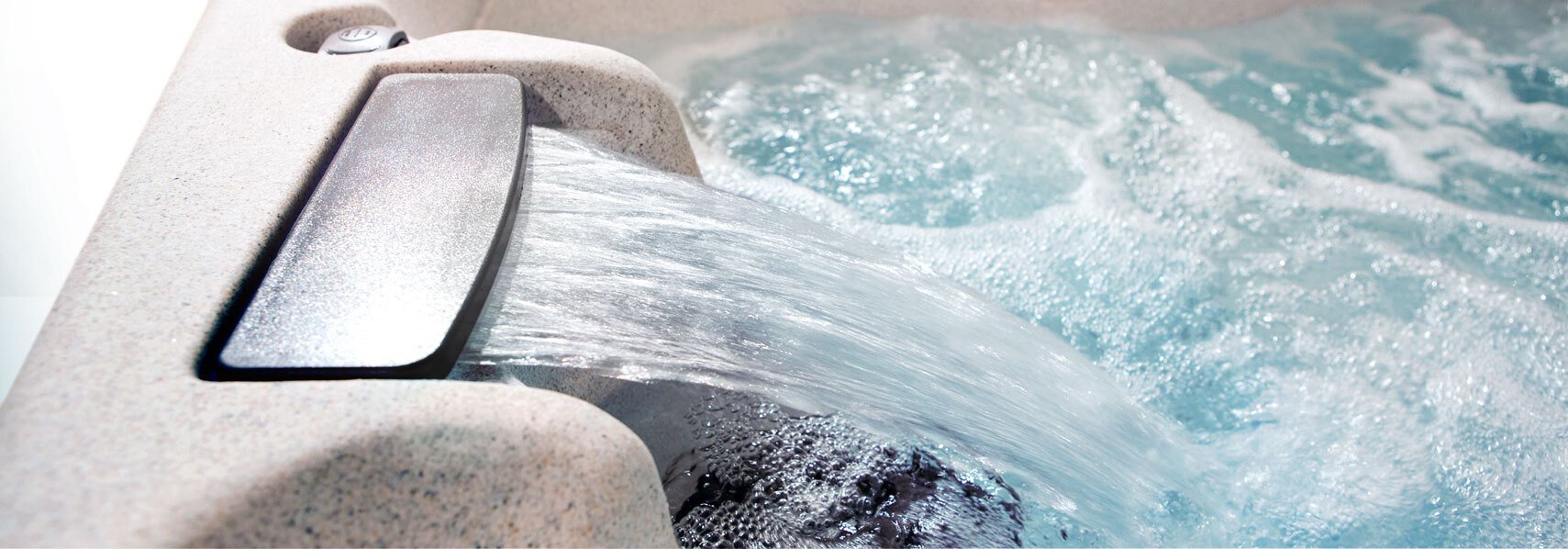 Waterfall water feature on a getaway hot tub