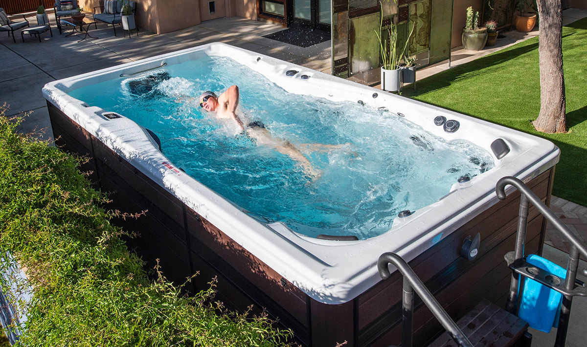 Ben Hoffman swimming in an H2X Challenger series swim spa by master spas