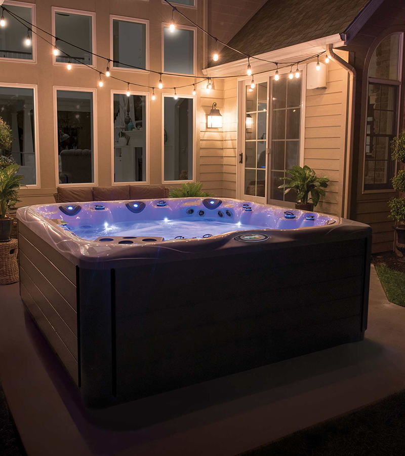 Beautiful hot tub lights set the scene for relaxing in a Master Spas hot tub