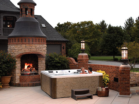 Couple relax in hot tub