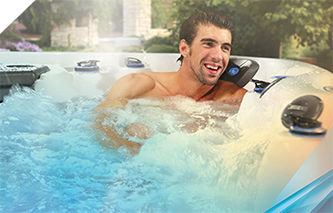 Michael Phelps smiling in hot tub